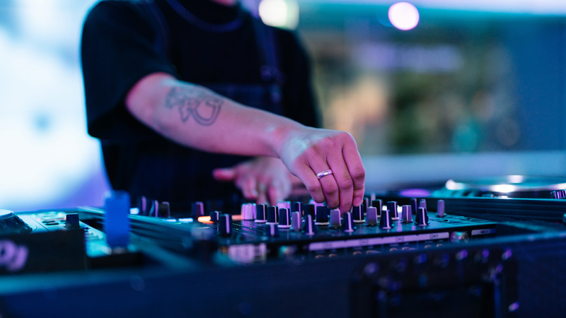 A DJ works his decks.