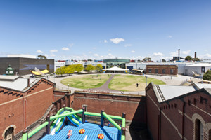 A view from above of a small oval surround by buildings