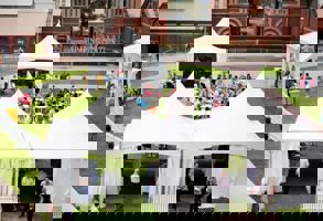 White marquee set up on a grassed area