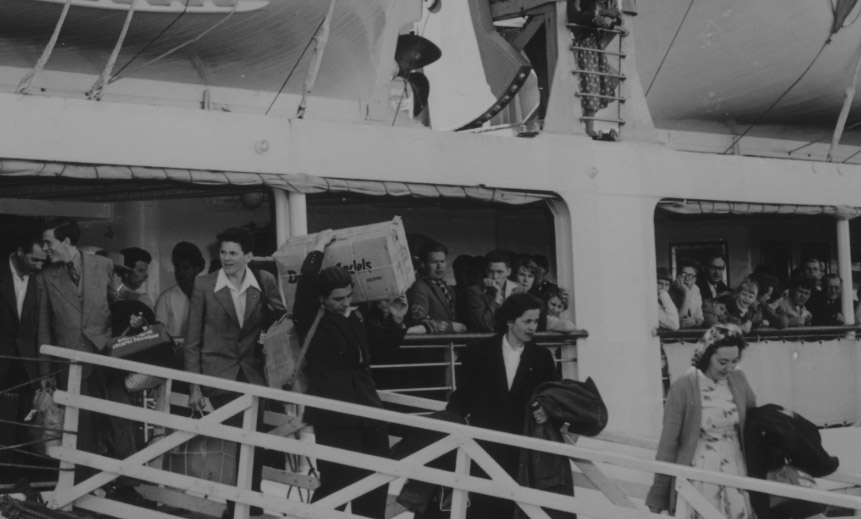 People disembarking from a ship