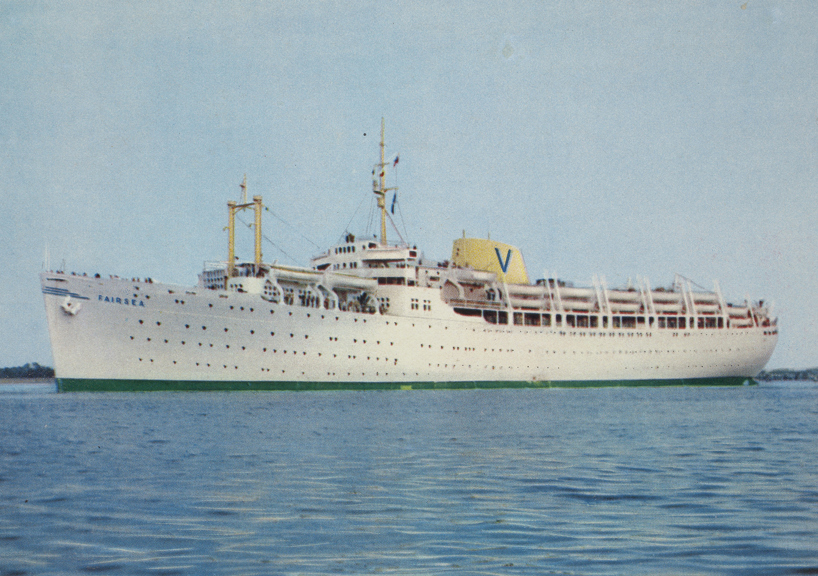 A white passenger ship on blue seas.