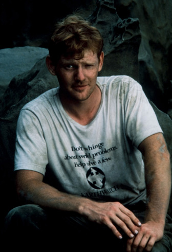 Portrait of a man with dirt on his face and arms