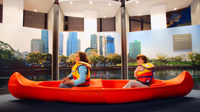Two girls in a canoe in the Sportsworks exhibition