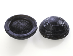 Tektite button