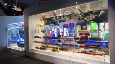 Man looking into a exhibition showcase