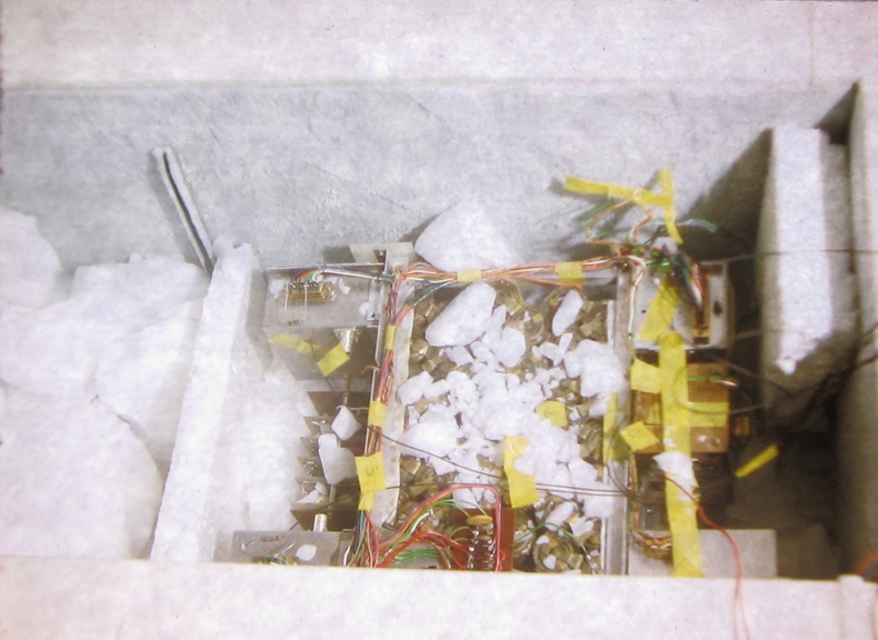 Electronic compenents covered in ice. 