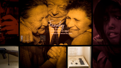 Leaving Home exhibition in Immigration Museum showing Motivations wall - Family 