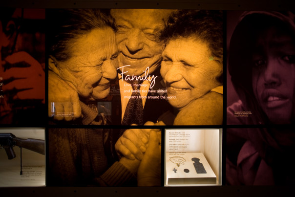 Leaving Home exhibition in Immigration Museum showing Motivations wall - Family 