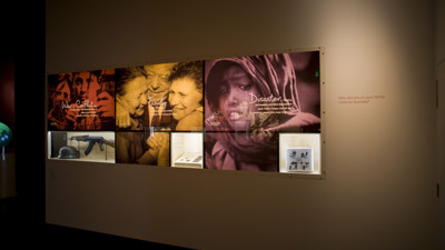Leaving Home exhibition in Immigration Museum showing Motivations wall 