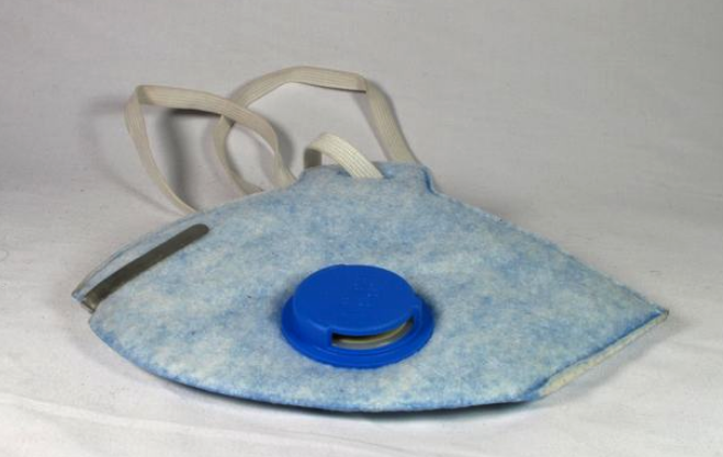 Pale blue, flat folded face mask with blue valved respirator. Elastic loop to secure to face.