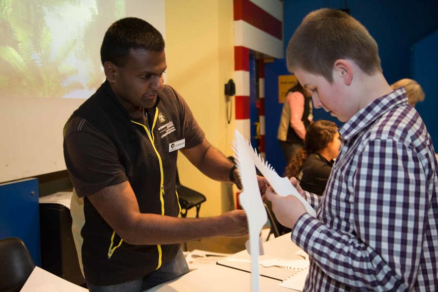 Two men making craft activity