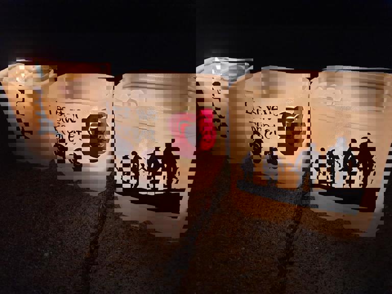 Candles in tubs with ANZAC drawings