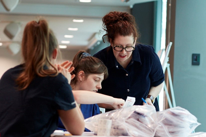 People working with museum objects