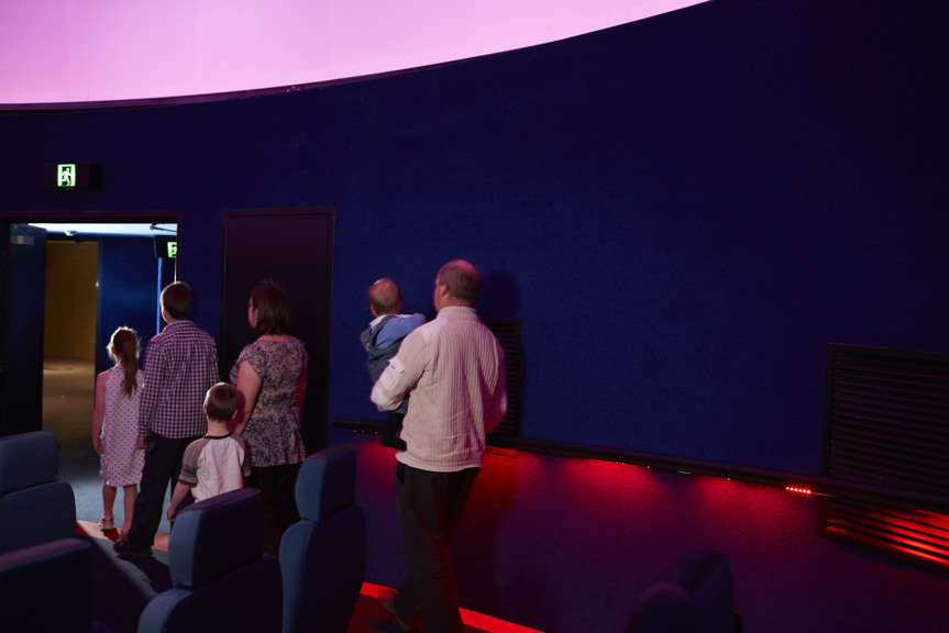 Family  of 6 leaving Planetarium