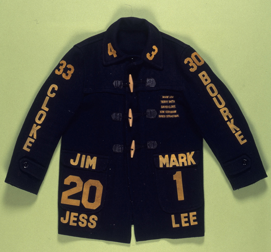 A customised duffle jacket with yellow players' names.