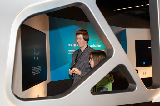 Teenager engaging with the Road To Zero interactive displays