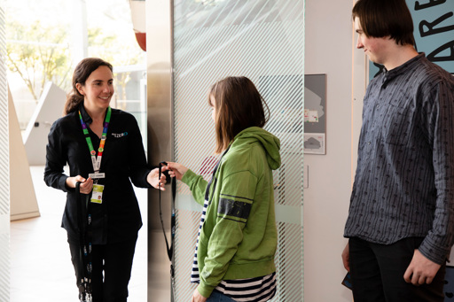 Teenagers returning interactive pass tags at the end of the Road To Zero educational program