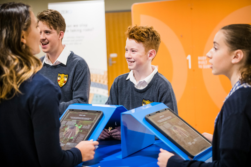 Four students standing