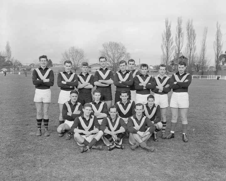Team portrait of the Shell Company Australian Rules Football team, taken at Toorongo Oval.