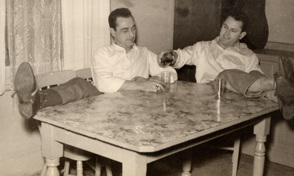 Bruno Ceresoli and his brother Ugo Ceresoli enjoying a drink at 230 Palmerston Street, Carlton, where they rented accommodation, in 1953