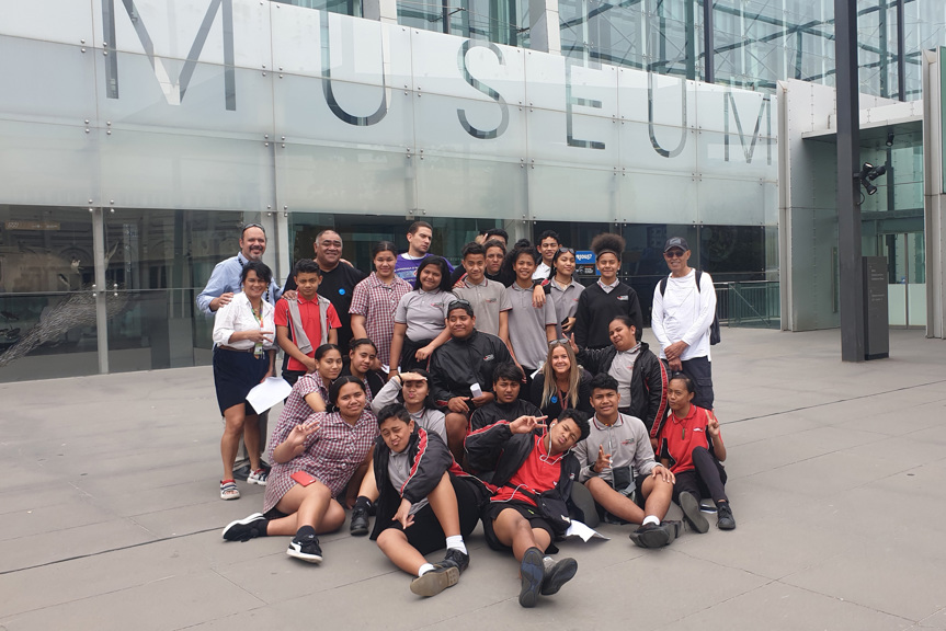 Group of school students in front of the museum