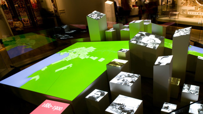 Melbourne Story exhibition Dynamic Map with visitors in the distance