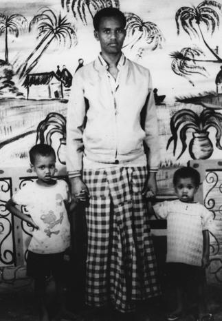 Man with two children