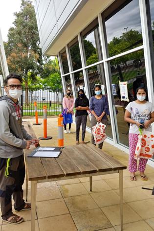 Man and students at a university