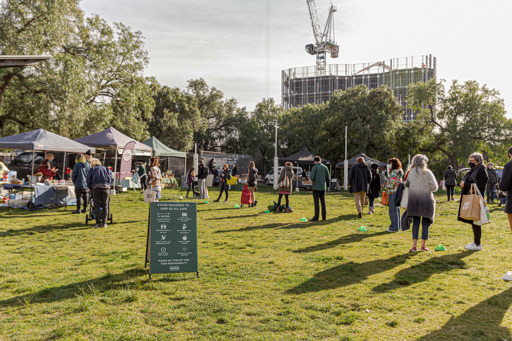 People forming a queue at the farmers market