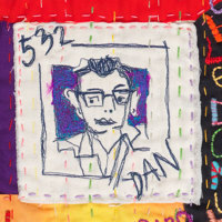 Detail of embroidered quilt depicting Victorian Premier Daniel Andrews