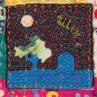 Hand embroidered quilt "Silences". A cityscape at night.