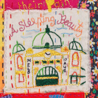 Detail hand embroidered quilt showing a food items in a pantry