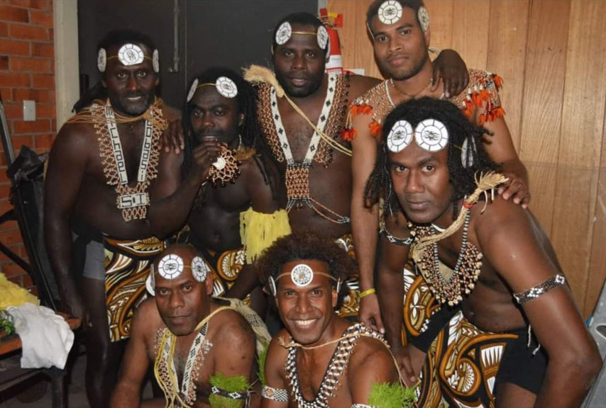 Group of male dancers posing for a photograph