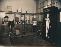 Medical imaging sales showroom, which features a wall cabinet containing x-ray screens, film and other Kodak x-ray products. 