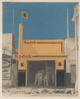A Kodak shop front being constructed. The building and the sky have been hand coloured
