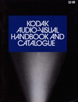 A catalogue with black front cover with white text in blue text box