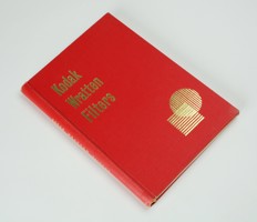 Red hardcover book with gold print on the front cover and down the spine