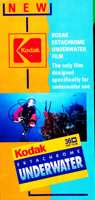 Glossy fold-out colour paper brochure with image of scuba diver on cover. Printed in red, yellow and blue colour scheme.