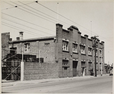 Black and white photograph of a brick building