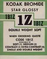 Small colour printed label. Green and white background with black text.