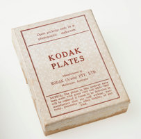 Box with a white lid with a red printed label