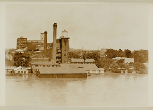 Buildings partially submerged in water.