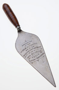 Engraved brick laying trowel