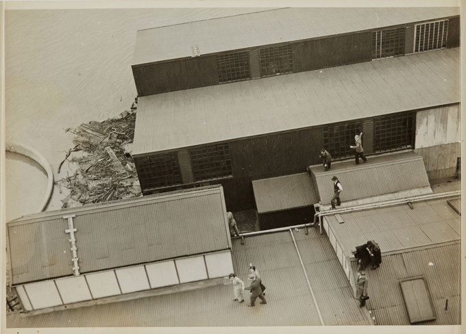Building partially submerged in water.