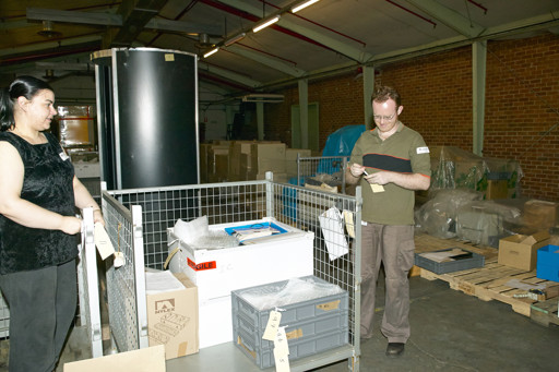 Museum Victoria collection management staff packing objects at the old Kodak Factory site, Coburg, for transfer to the museum