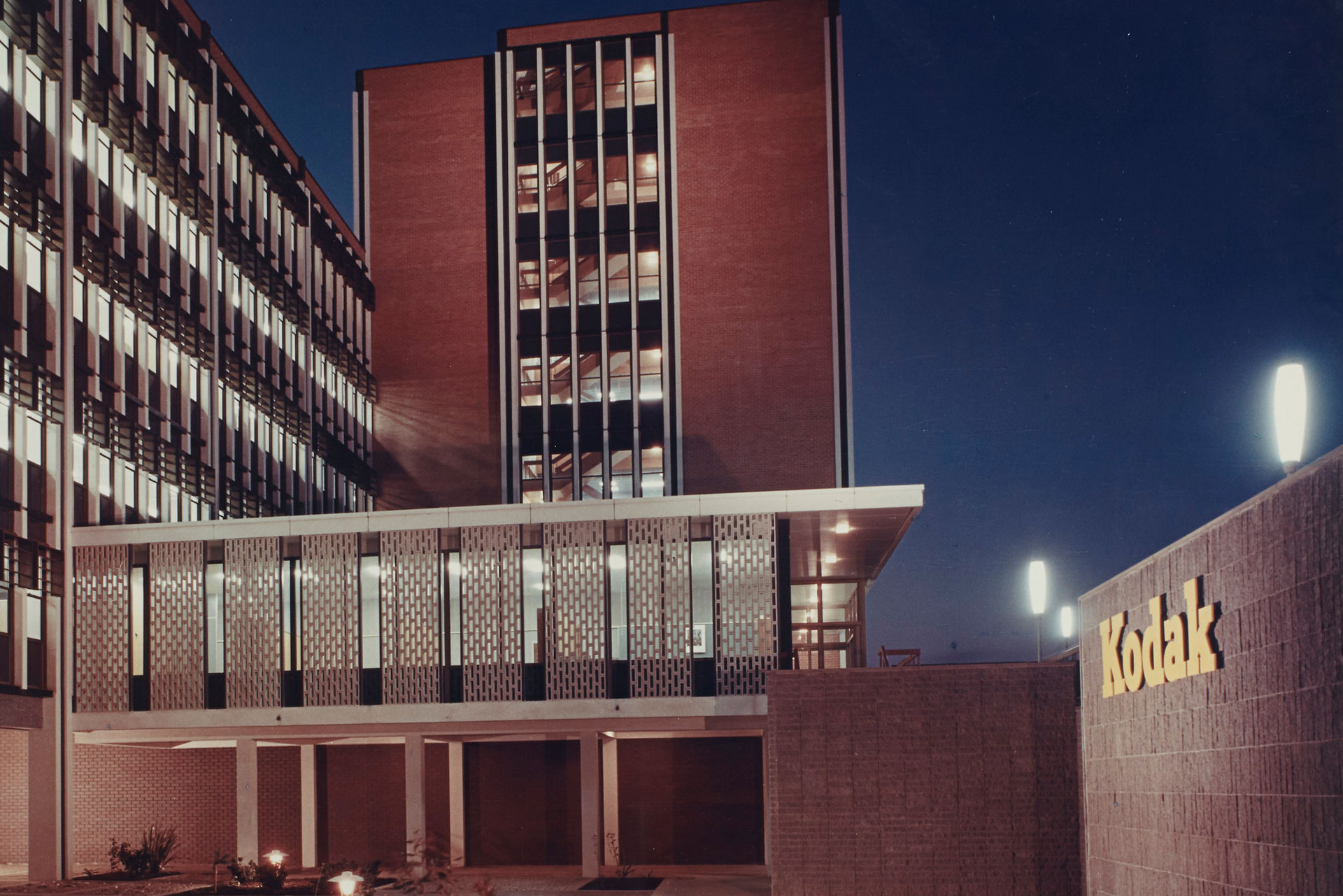 Exterior of a 1950s office building at night