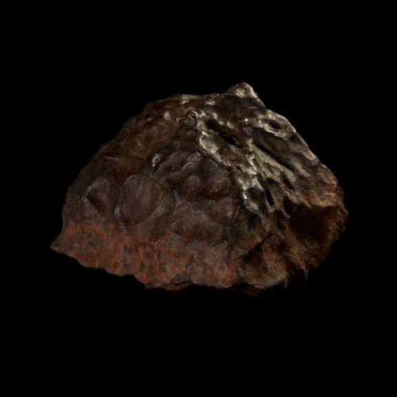 A rock with smooth indents on the surface