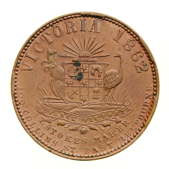 Round disc showing the Australian Coat of Arms