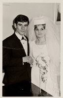 Bride and groom holding hands