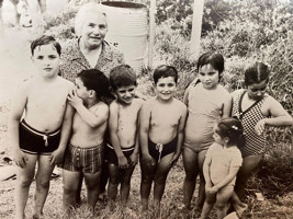 Woman with children in bathing suits